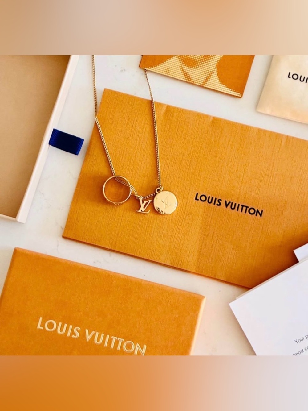 NIB Louis Vuitton Monogram Ring Necklace Gold sold out everywhere